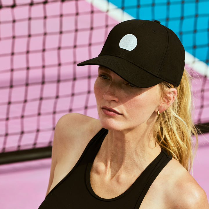 Female model wearing Afternoon social club black icon hat