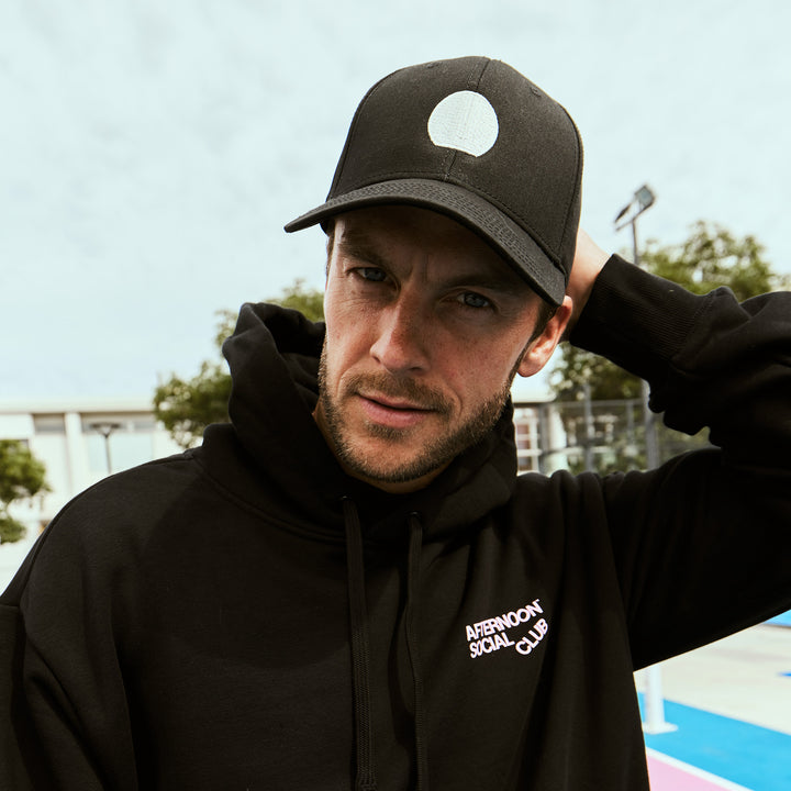Male model wearing Afternoon social club black icon hat