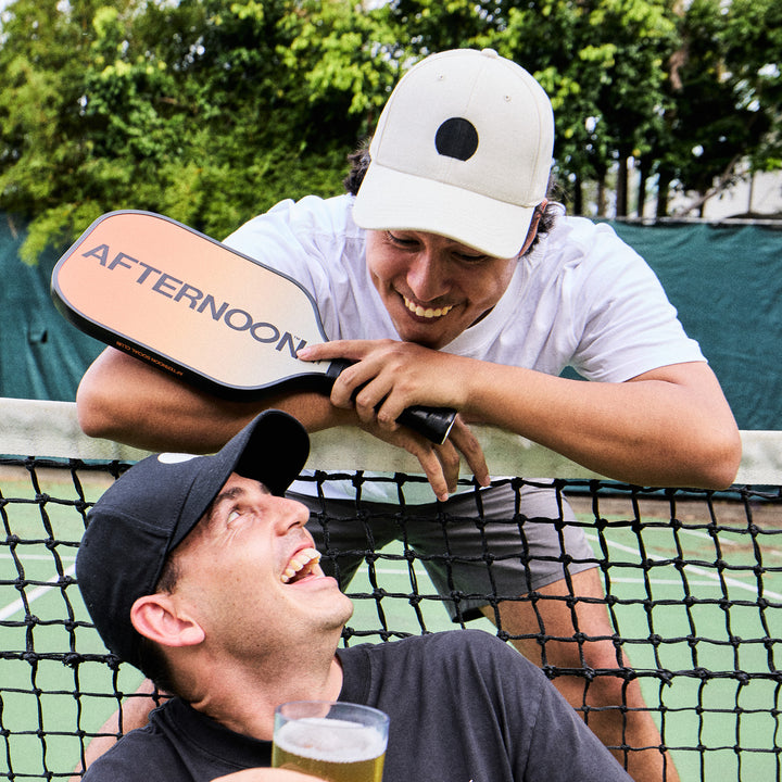 Having fun on the court wearing afternoon social club icon hat