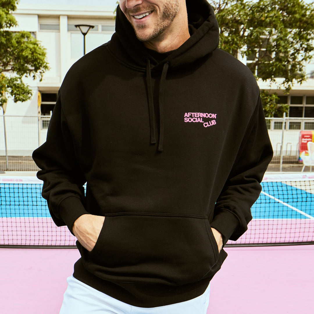 Man wearing Afternoon Social Club heavy hoodie in black.