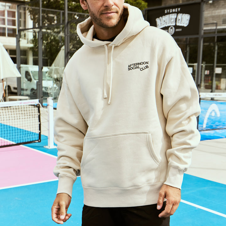 Man wearing Afternoon Social Club heavy hoodie in Ecru.