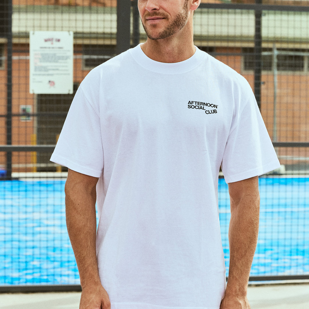 Man wearing Afternoon Social Club heavy tee in white.