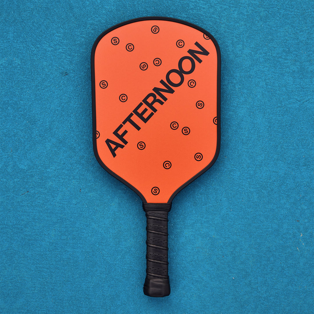 Orange Fiberglass Pickleball Paddle featuring the words Afternoon SC